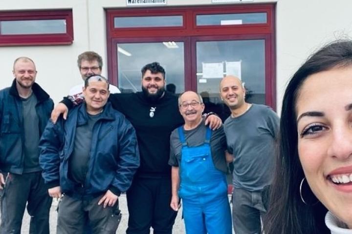 From trainee to plant manager: Feyza (right) with her team in front of their plant