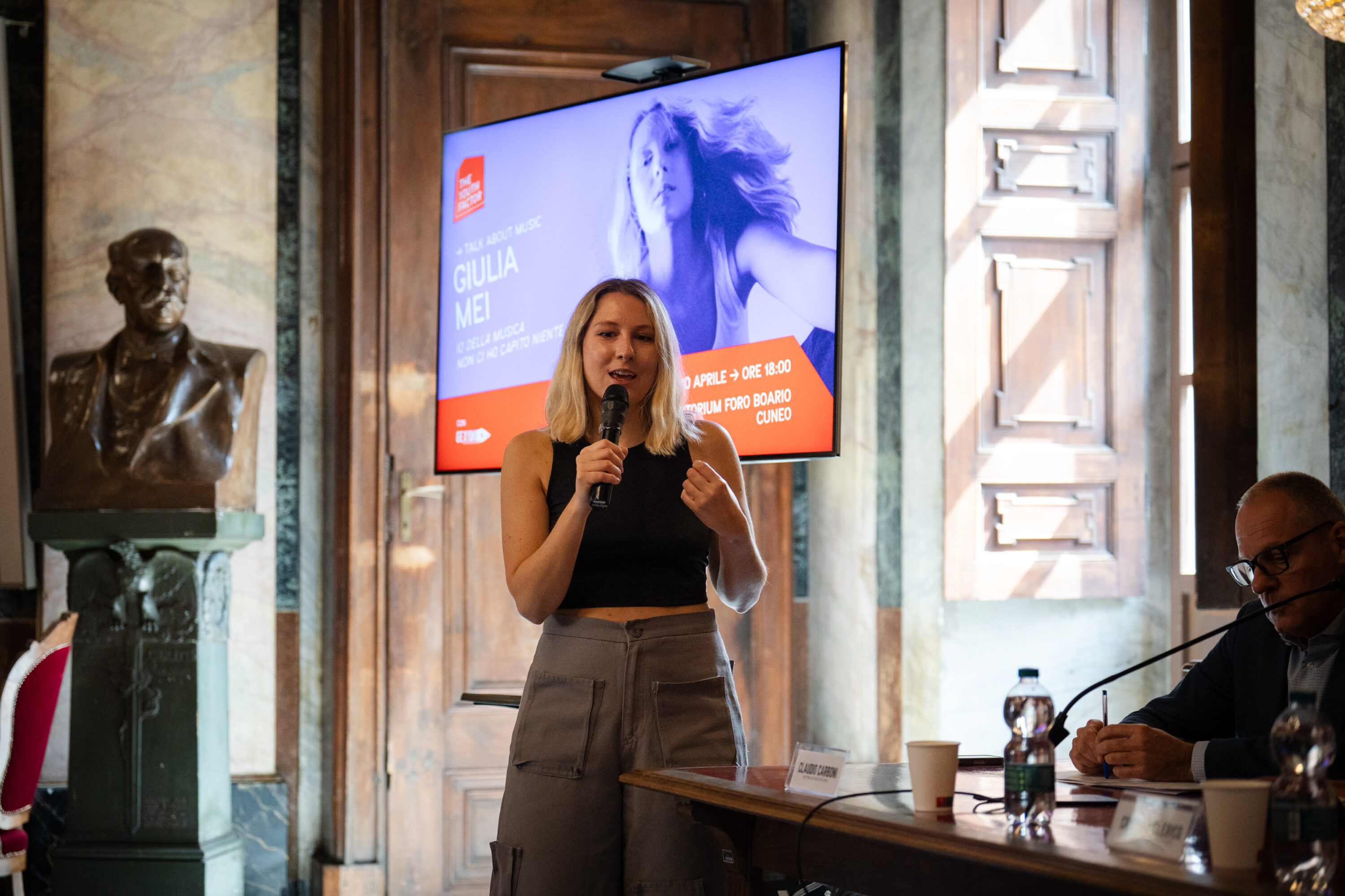 Giulia Mei interviene alla conferenza stampa di "Città in note. La musica dei luoghi" (ph@Marco Rostagno)