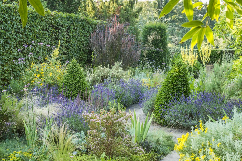 Dry Garden, a small, neat garden with pastel colours.
