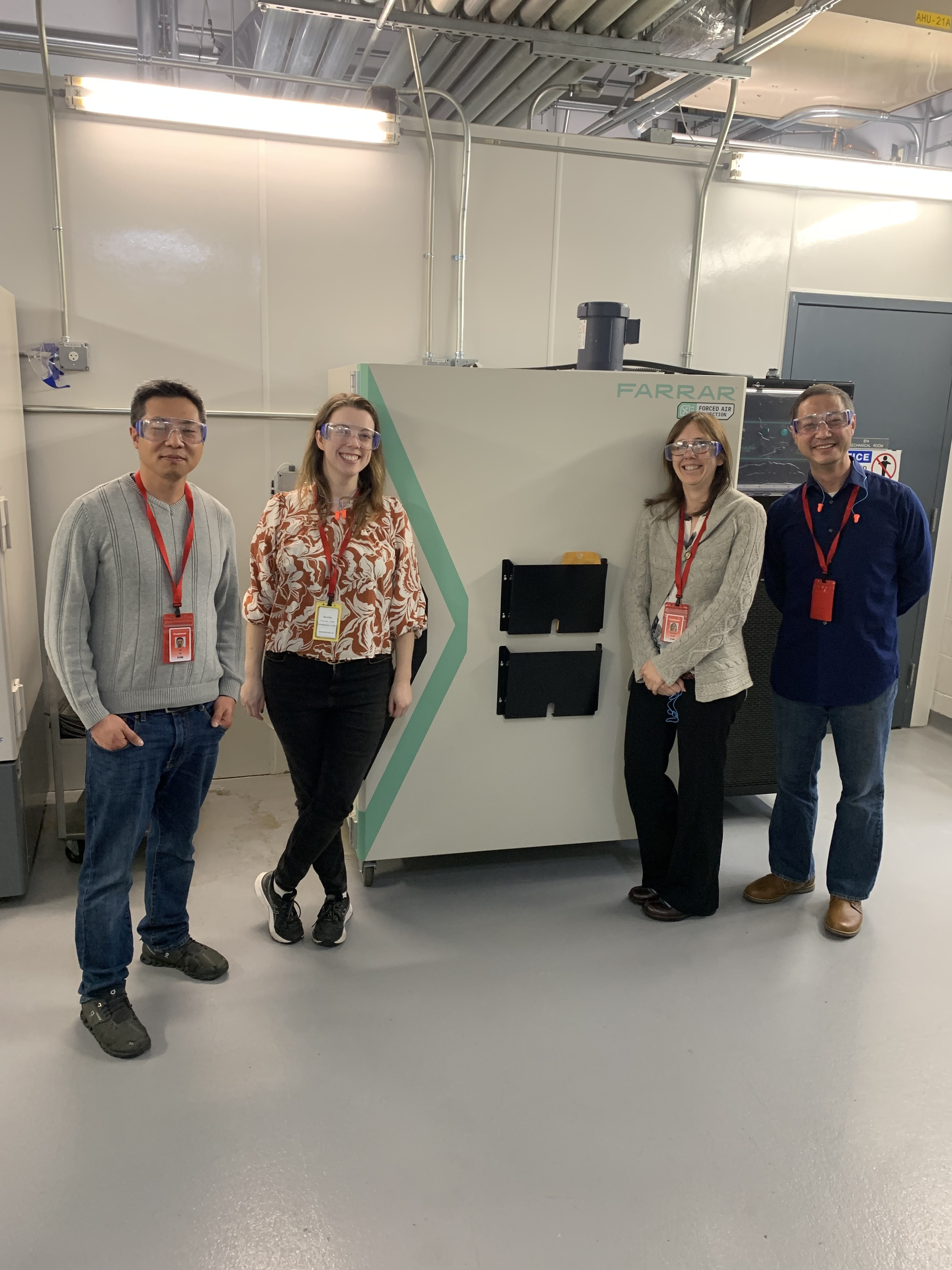 Louise alongside freezer equipment