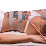 Electrodes,On,Young,Woman's,Body,At,The,Spa.