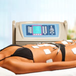 Therapist,Applying,Lipo,Massage,On,Girls,Body,In,Spa.