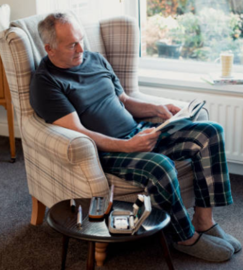 Carer-sitting-in-chair.PNG