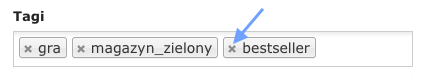 Pole z tagami produktu z aktywnym przyciskiem usuwania tagu "bestseller" obok tagów "gra" i "magazyn_zielony