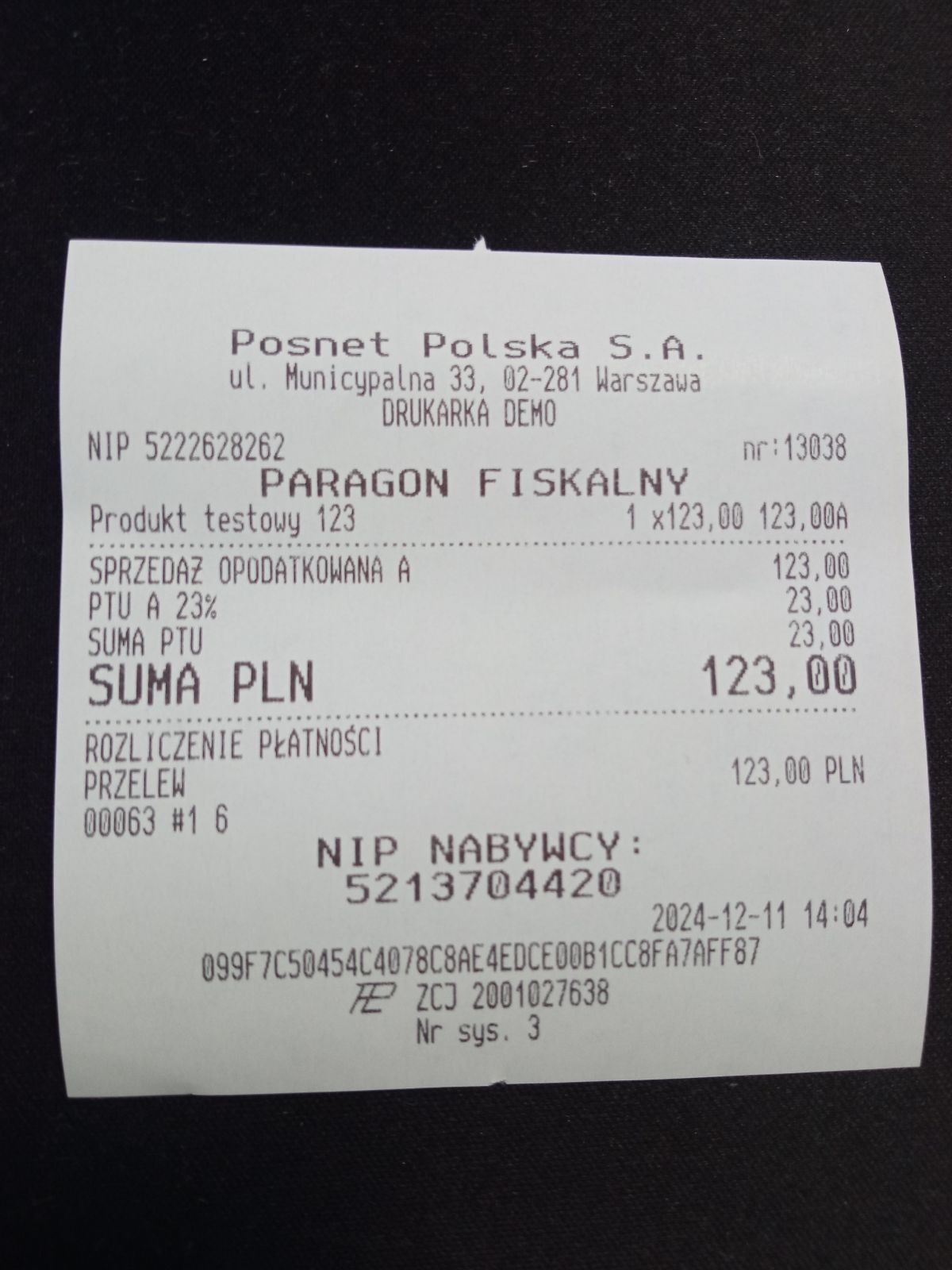 Paragon fiskalny wydrukowany przez drukarkę Posnet z numerem NIP nabywcy, szczegółami zakupu i kwotą brutto 123,00 PLN.