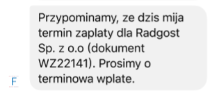 Przykładowa treść powiadomienia SMS o zbliżającym się terminie płatności faktury. Wiadomość przypomina odbiorcy o konieczności dokonania płatności dla firmy Radgost Sp. z o.o. za dokument WZ22141.