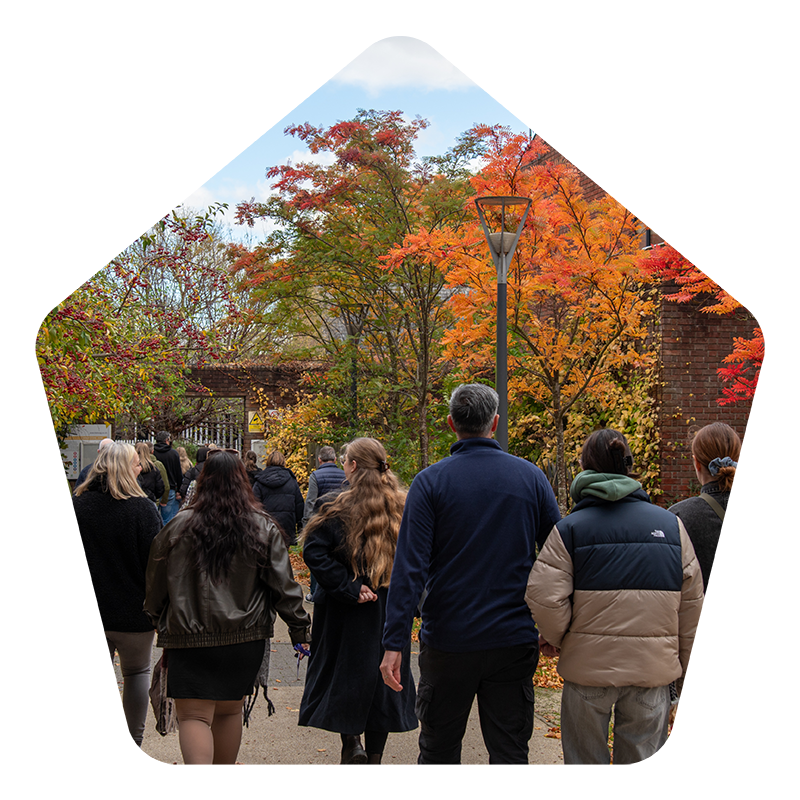 A photo of people on a campus tour at Lincoln Bishop University.
