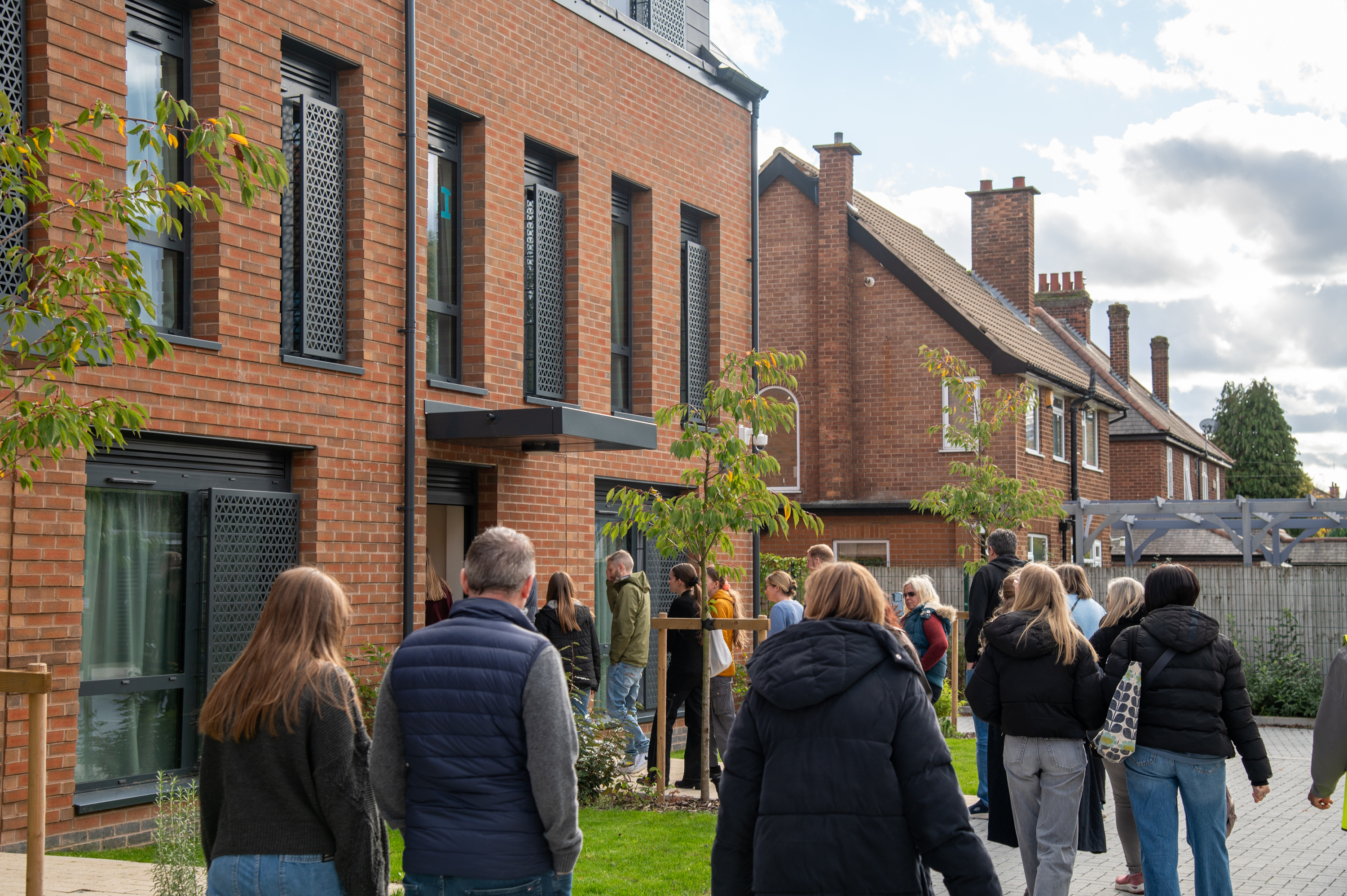 Visitors exploring a Student Village town house as part of an Open Day Accommodation Tour