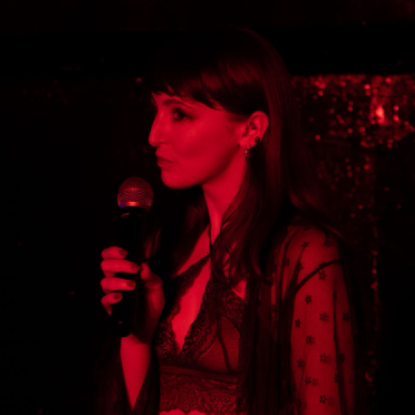 Photo of Bella performing. Press image for Impurity event.