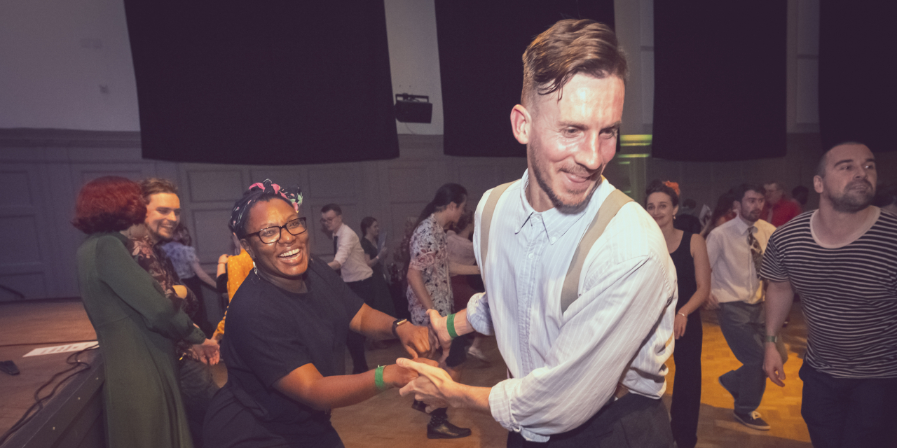 Image of Bishopsgate Swing participants in motion.