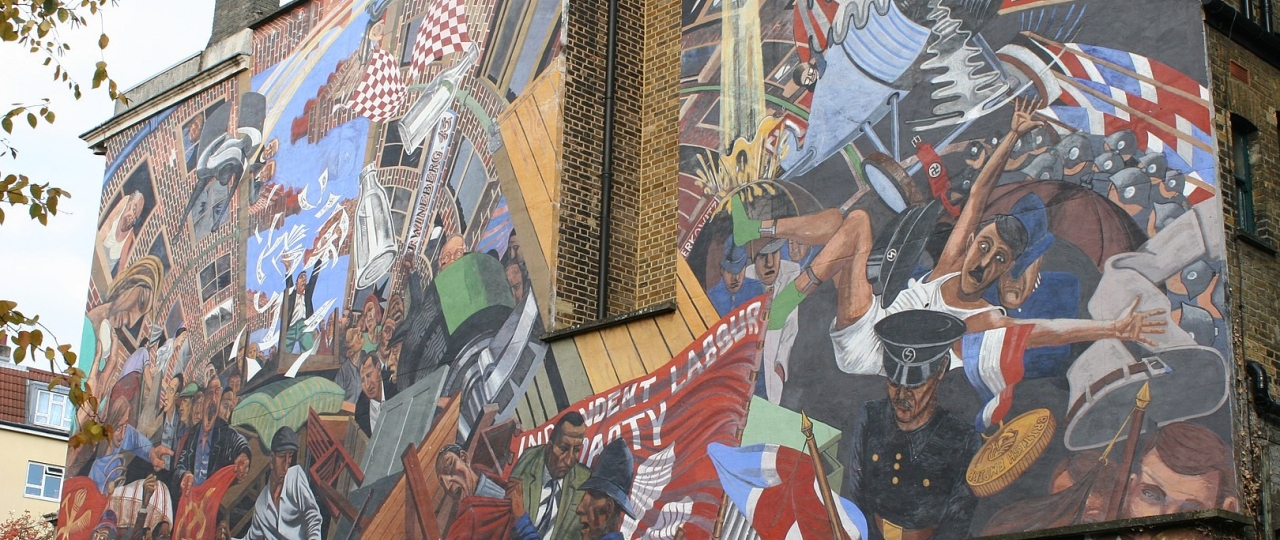 An image of the Cable St mural which is on the side of a building.