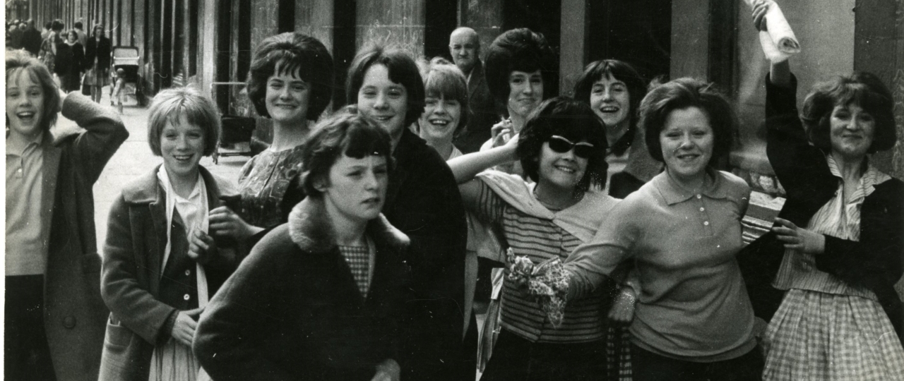 A black and white photo of a group of young women