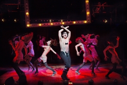 A performance of Cabaret, with performers dancing on stage
