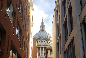A photo taken through a side street of St. Pauls.