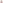 A pink poster in the shape of a triangle, which says: "Defend Gay's The Word Benefit Jimi Somerville & Richard Coles UK Debut Appearance" with the address underneath.