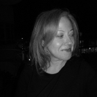 A portrait photo of tutor Sarah Wise. It is a black and white photo.