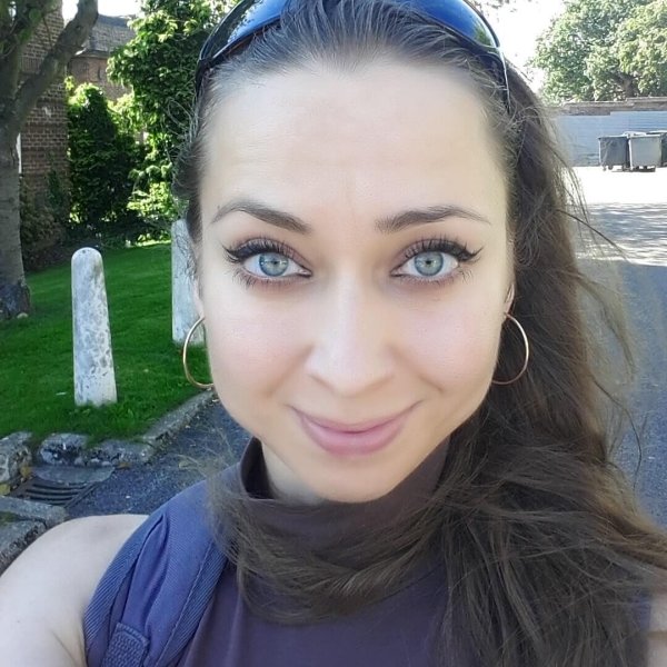 A portrait photo of tutor Arina.