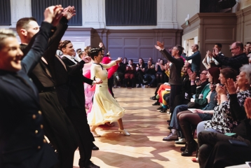 Image from The Pink Jukebox Trophy 2025. Competitors receiving applause from crowd.