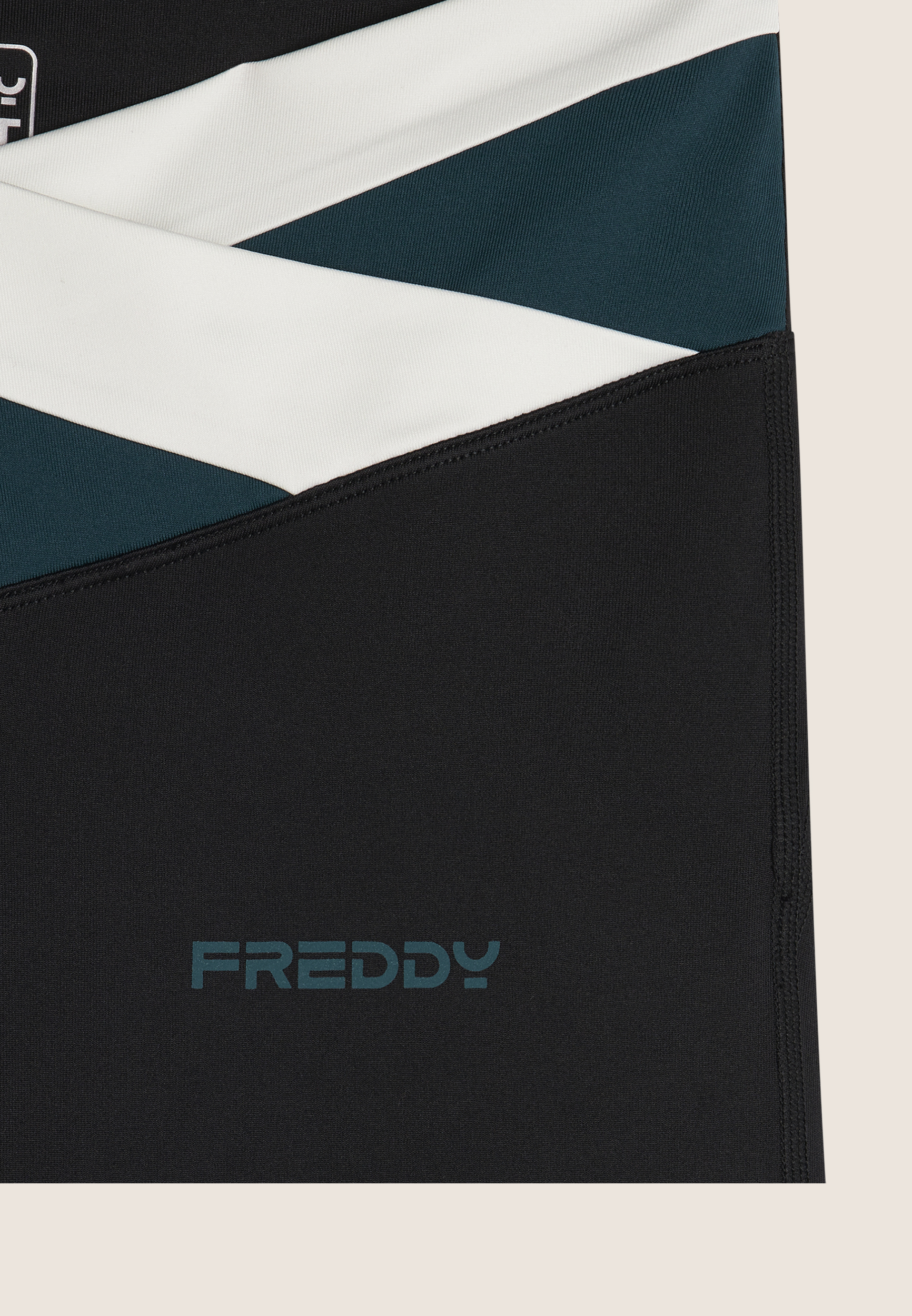 FREDDY Leggings acampanados de cintura alta bicolor entrecruzada - Imagen 6 de 6