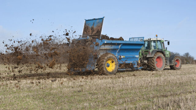 farmer farm yard manure