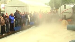 Video: Belgian farmers dump manure and milk in latest protest