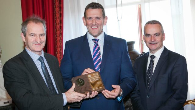 Declan Cunningham from Moy Park (centre) receives the BITCNI Platinum award for sustainability from David Small, NIEA chief executive; and Chris Conway from Business in the Community