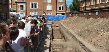 Crowd Behind Barriers