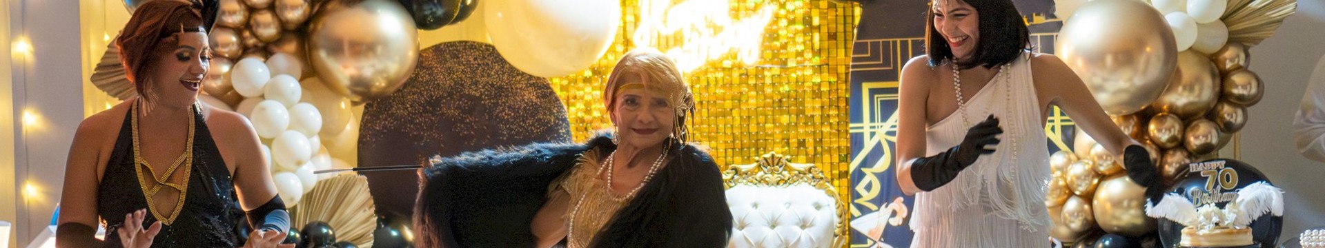 Three ladies dressed in gatsby theme for a hen weekend.