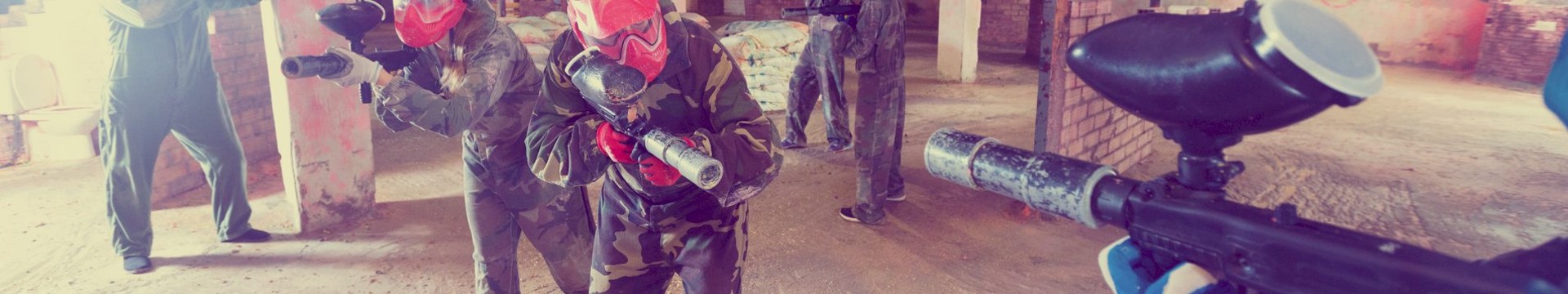 A group of girls playing paintball on their hen do