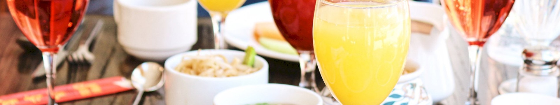 Table with drinks and brunch items 