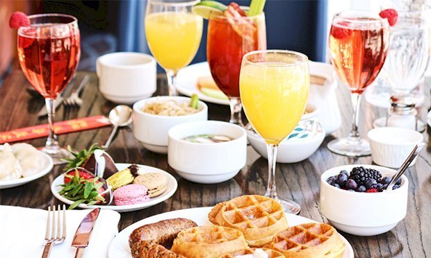 A selection of food and prosecco at a hen do bottomless brunch