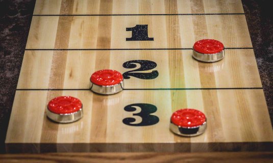 A shuffleboard mid game