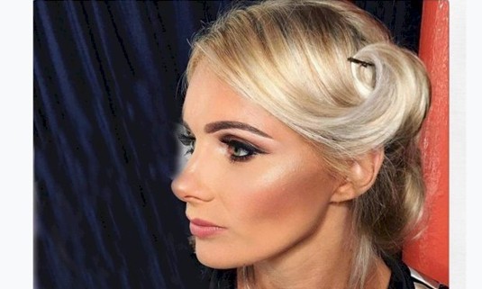 Girl with hair up and make up done