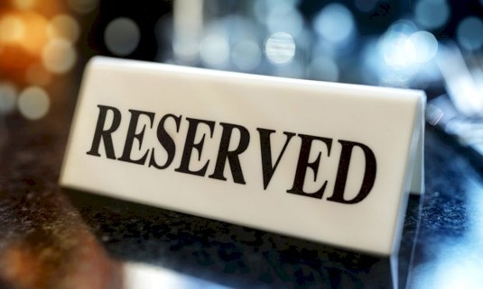 Reserved area sign on a table