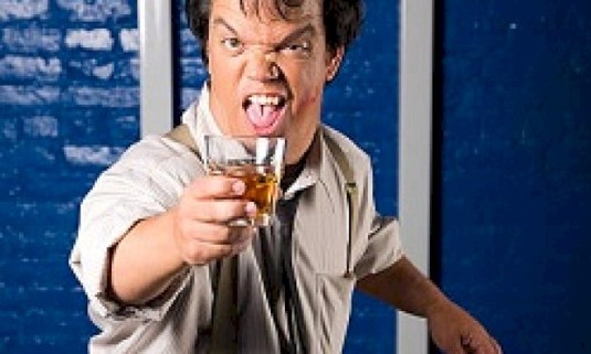 A smiling dwarf ready to be hired for a stag do