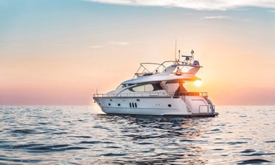 Sunset of yacht across the sea in Magaluf