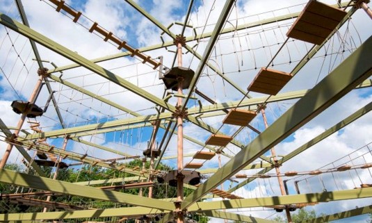Sky high course with ropes and different platforms to walk across - Hen Weekends Activity 