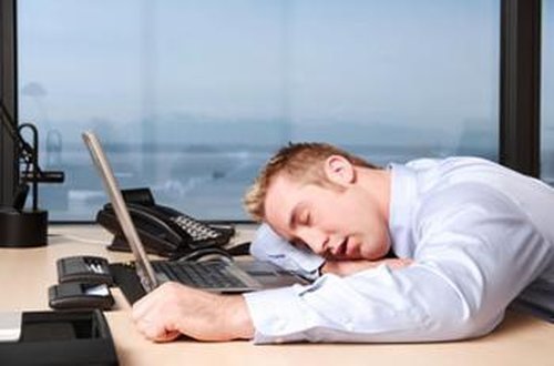 overtime at work man sleeping