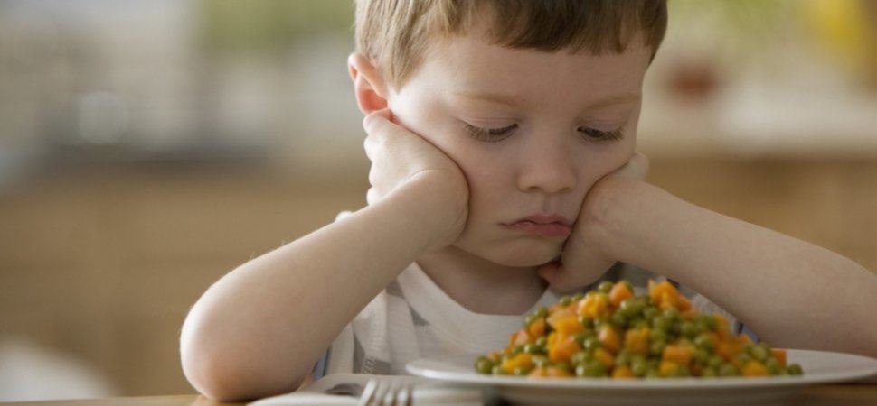 kid with a food plate