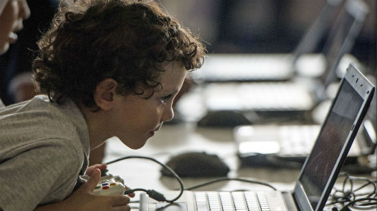 kid using laptop