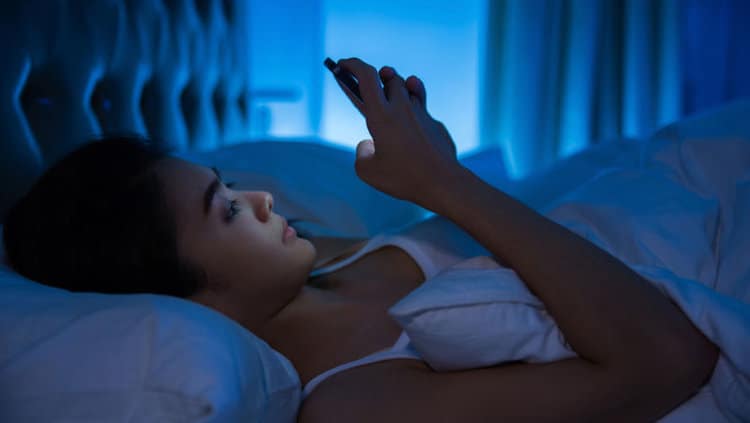 using phone in bed