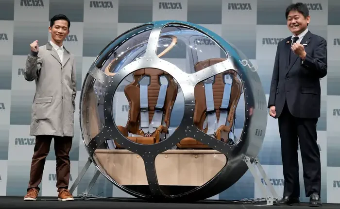 space balloon capsule front CEO