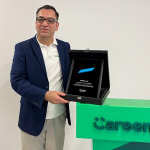 Careem representative receiving the MENA Tech Editors' Choice 2024 award for the Careem Super App.