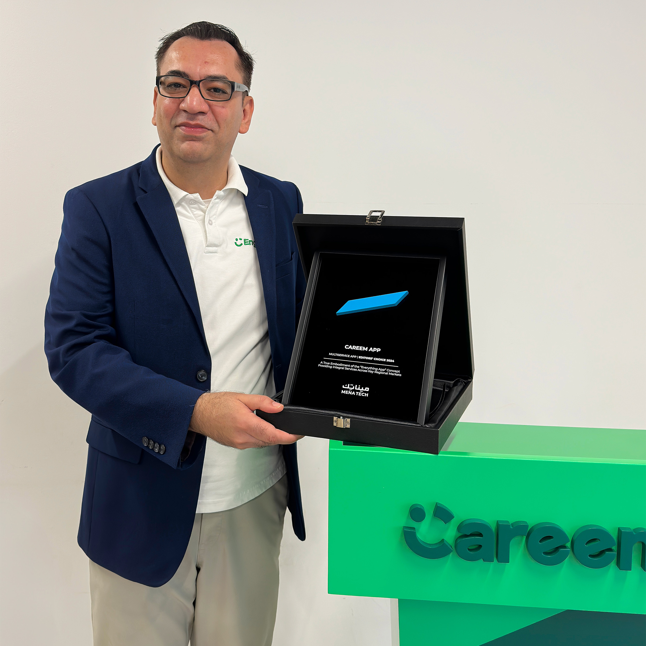 Careem representative receiving the MENA Tech Editors' Choice 2024 award for the Careem Super App.