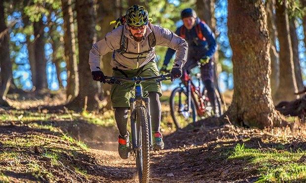 Two men enjoying mountain biking