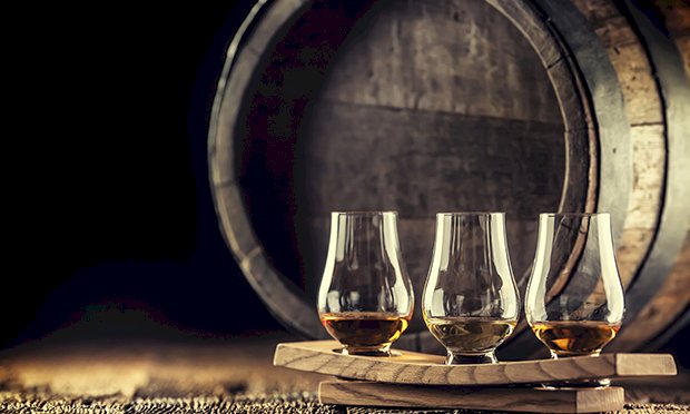 Three glasses of bourbon.