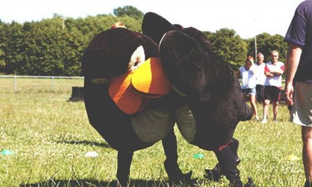 Penguin fancy dress outfits on a It's a Knockout stag party.