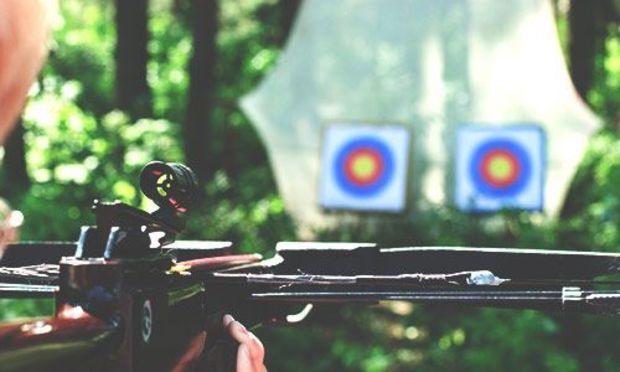 Crossbow shooting at target
