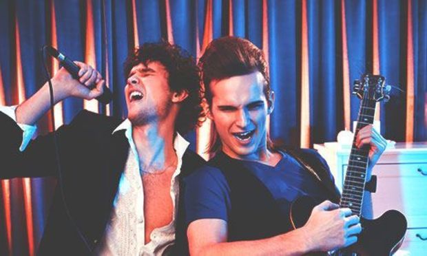 Guys singing Karaoke on a stag do