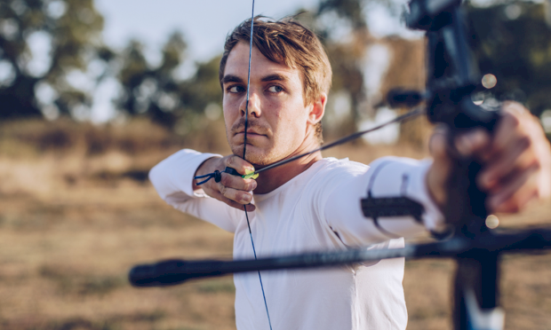 Male looking to shoot in archery
